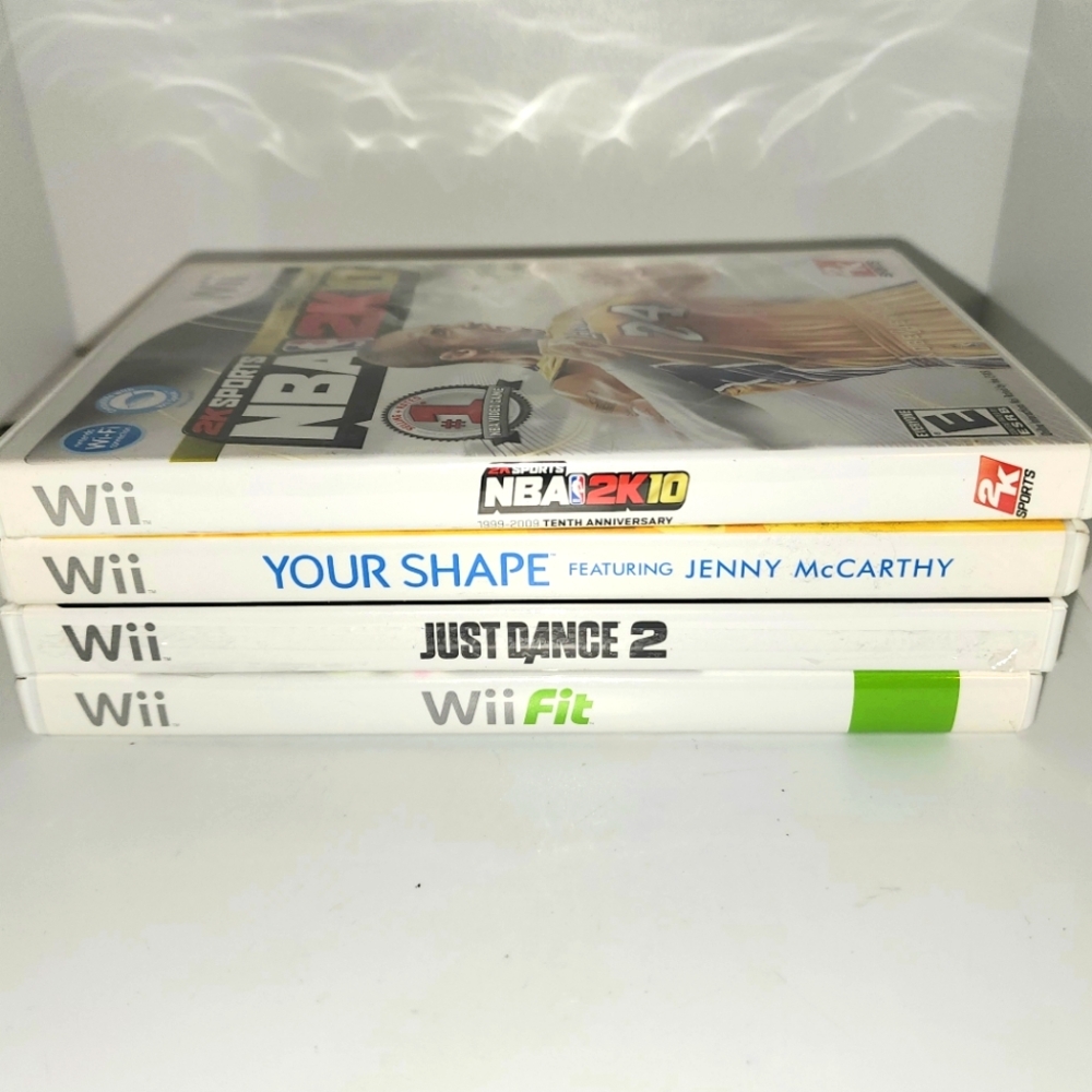 Nintendo Wii Game Bundle lot of 4... NBA 2K10, Just Dance 2 see description